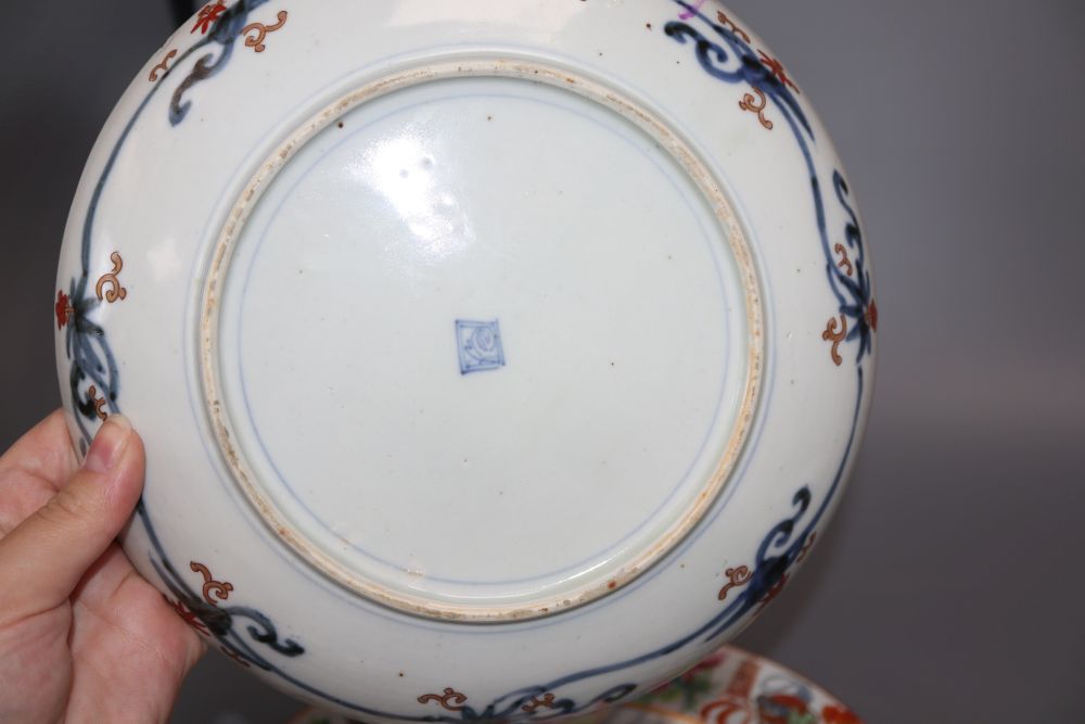 Six various Chinese porcelain dishes and a similar bowl, largest diameter 25cm